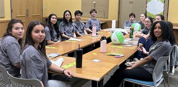 STUDENTS AT TABLE